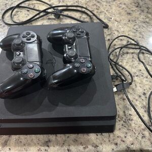 Sony Black Console with Dual Controllers